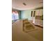 Bright kitchen features double sinks, ample counter space, and wood-look flooring at 10787 Sw 53Rd Cir, Ocala, FL 34476