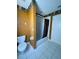 Bathroom with tub, shower, and brown walls at 10787 Sw 53Rd Cir, Ocala, FL 34476