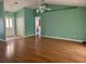 Spacious living area with laminate flooring and neutral walls at 10787 Sw 53Rd Cir, Ocala, FL 34476