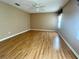Large bedroom with wood-look flooring and ceiling fan at 10787 Sw 53Rd Cir, Ocala, FL 34476