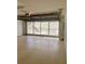 Bright garage with overhead door and extra storage at 10787 Sw 53Rd Cir, Ocala, FL 34476