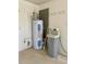 Water heater and water softener system in garage at 10787 Sw 53Rd Cir, Ocala, FL 34476