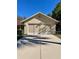 Two-car garage with screen doors at 10787 Sw 53Rd Cir, Ocala, FL 34476