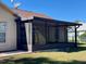 Spacious screened porch, perfect for relaxing outdoors at 10787 Sw 53Rd Cir, Ocala, FL 34476