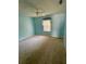Light blue bedroom with carpet and ceiling fan at 10787 Sw 53Rd Cir, Ocala, FL 34476