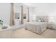 Cozy bedroom with a queen-size bed and plenty of natural light at 3554 Nw 55Th Cir, Ocala, FL 34482