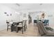 Dining area with hardwood floors and adjacent kitchen at 3554 Nw 55Th Cir, Ocala, FL 34482