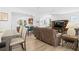 Open concept living and dining area with hardwood floors at 3554 Nw 55Th Cir, Ocala, FL 34482