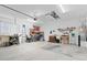 Spacious garage with workshop area and additional storage at 3554 Nw 55Th Cir, Ocala, FL 34482