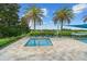 Relaxing community pool with lounge chairs and a shaded area at 3554 Nw 55Th Cir, Ocala, FL 34482