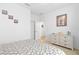 Spacious bedroom with dresser and en-suite bathroom access at 3554 Nw 55Th Cir, Ocala, FL 34482