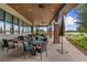 Relaxing community patio with covered seating area and lake views at 3554 Nw 55Th Cir, Ocala, FL 34482