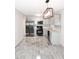 Modern kitchen with gray cabinets, granite countertops and stainless appliances at 3011 Nw 3Rd Ter, Ocala, FL 34475