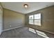 Bright and airy bedroom with neutral carpeting and large window at 13899 Sw 89Th St, Dunnellon, FL 34432