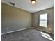 Bright and airy bedroom with neutral carpeting and large window at 13899 Sw 89Th St, Dunnellon, FL 34432