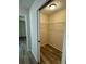 Walk-in closet with wire shelving and wood-look flooring at 12 Pecan Run Radl, Ocala, FL 34472