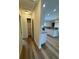Hallway with access to kitchen and pantry at 12 Pecan Run Radl, Ocala, FL 34472