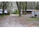 Overgrown vacant lot with mobile home and sheds at 16684 And 16690 S Us Highway 301, Summerfield, FL 34491
