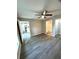 Spacious bedroom with a view of the kitchen and en-suite bathroom at 6044 Nw 65Th Pl, Ocala, FL 34482