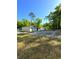 View of home from backyard, showing grassy area at 6044 Nw 65Th Pl, Ocala, FL 34482