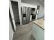 Kitchen features a pantry and stainless steel refrigerator at 6044 Nw 65Th Pl, Ocala, FL 34482