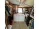 Laundry room with washer, dryer, and storage at 10300 Sw 98Th Ter, Ocala, FL 34481