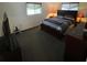 Main bedroom with king-size bed and dark wood furniture at 10300 Sw 98Th Ter, Ocala, FL 34481
