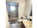 Clean bathroom with shower/tub combo, toilet and vanity at 10300 Sw 98Th Ter, Ocala, FL 34481