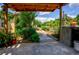 Pathway leading from outdoor kitchen to street at 567 Silver Course Run, Ocala, FL 34472