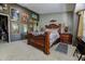 Primary bedroom with a large bed and wall art at 567 Silver Course Run, Ocala, FL 34472