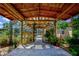 Covered walkway to pool and BBQ area at 567 Silver Course Run, Ocala, FL 34472