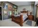 Primary bedroom with a large bed and wall art at 567 Silver Course Run, Ocala, FL 34472