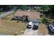 Aerial view of a single-Gathering home with a pool and yard at 567 Silver Course Run, Ocala, FL 34472