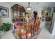 Formal dining room with wood table and hutch at 567 Silver Course Run, Ocala, FL 34472
