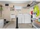 Laundry room with washer, dryer, and utility sink at 7994 Se 174Th Belhaven Loop, The Villages, FL 32162