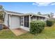 Charming single story home with a screened porch and well-maintained landscaping at 10881 Sw 79Th Ter, Ocala, FL 34476