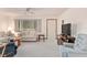 Relaxing living room, featuring a window and a TV at 10881 Sw 79Th Ter, Ocala, FL 34476