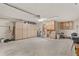 Spacious garage offering ample storage with overhead cabinets at 10881 Sw 79Th Ter, Ocala, FL 34476