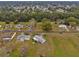 Aerial view of residential neighborhood with homes and lush green landscape at 10881 Sw 79Th Ter, Ocala, FL 34476