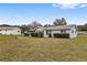 Single story home with screened porch and expansive backyard at 10881 Sw 79Th Ter, Ocala, FL 34476