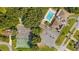 Aerial view of community tennis courts, pool, and clubhouse at 10881 Sw 79Th Ter, Ocala, FL 34476