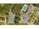 Aerial view of community tennis courts, pool, and clubhouse at 10881 Sw 79Th Ter, Ocala, FL 34476