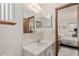 Simple bathroom with a single sink and a mirror at 10881 Sw 79Th Ter, Ocala, FL 34476