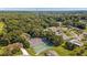 Aerial view of community tennis courts, pool, and clubhouse at 10881 Sw 79Th Ter, Ocala, FL 34476
