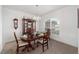 Formal dining room with a wood table and chandelier, offering an elegant feel at 3235 Se 43Rd Ave, Ocala, FL 34480