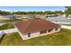 Aerial view of house showcasing back patio and yard at 3235 Se 43Rd Ave, Ocala, FL 34480