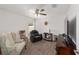 Relaxing sitting room with comfy chairs and a TV at 3235 Se 43Rd Ave, Ocala, FL 34480