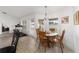 Casual breakfast nook with wood table and chairs, near a treadmill at 3235 Se 43Rd Ave, Ocala, FL 34480