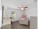 Small bedroom with twin bed and plenty of natural light at 3235 Se 43Rd Ave, Ocala, FL 34480