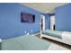 bedroom with twin beds and a flat-screen TV at 3004 Mahalo Dr, Davenport, FL 33897